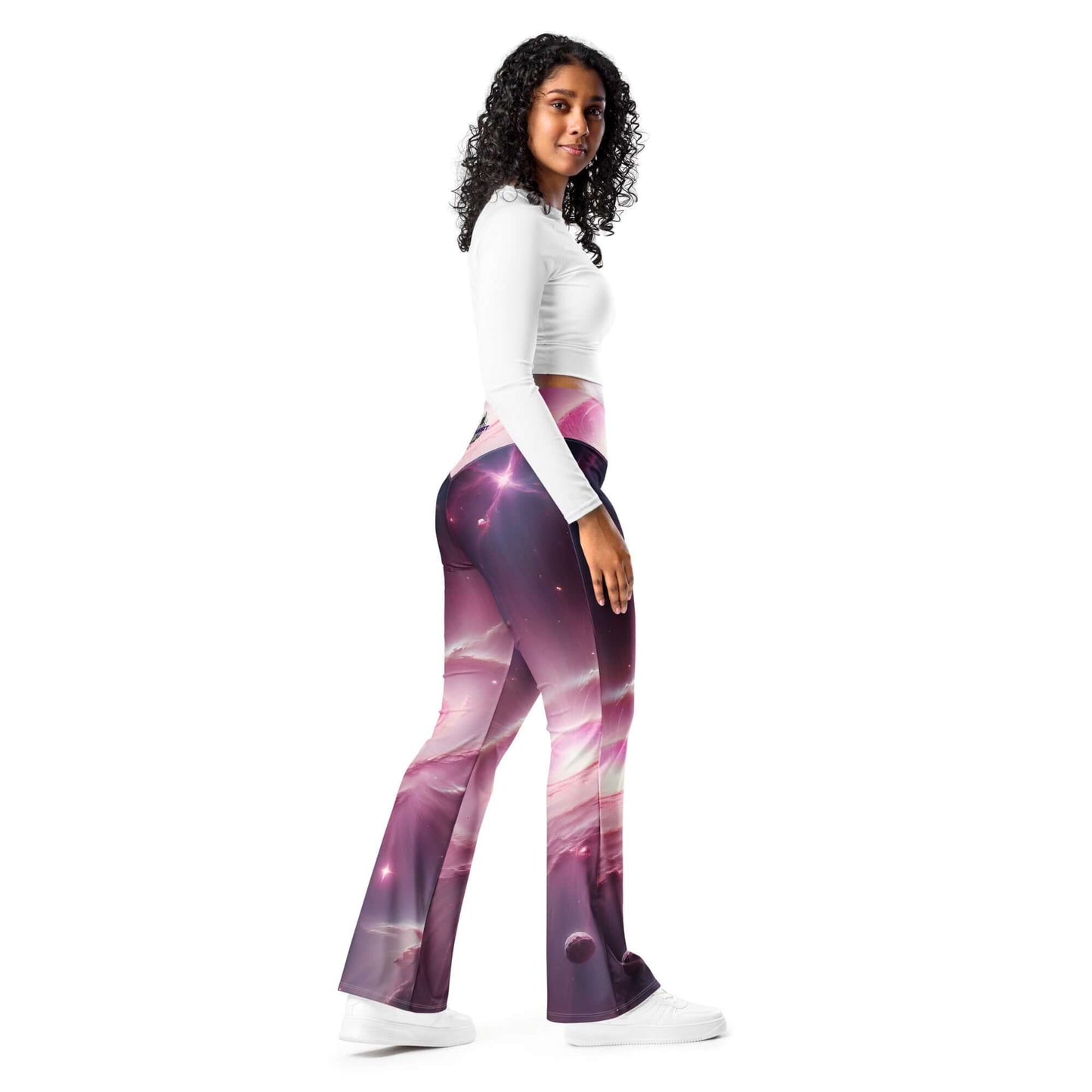 Women’s pink cosmic leggings with a flared cut and vibrant space-inspired design